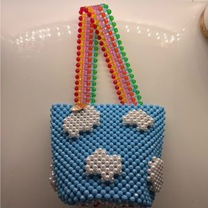 Susan Alexandra cloud / rainbow bucket bag